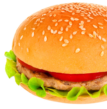 Big beautiful juicy burger with meat and vegetables. Isolated on white の写真素材