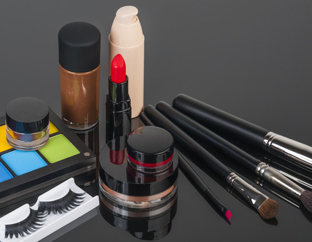 Set of professional makeup and cosmetics. on a black background isolatedの写真素材
