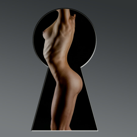 Sexy body nude woman. Naked sensual buttocks isolated on blackの写真素材