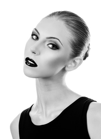 Professional Make up concept. Portrait of young beautiful woman with beauty makeup and perfect skin. Isolated on white backgroundの写真素材