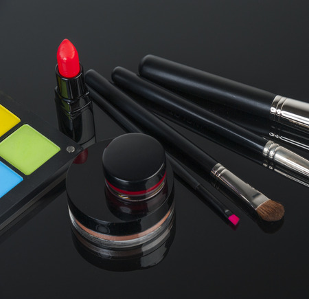 Set of professional makeup and cosmetics. on a black background isolatedの写真素材