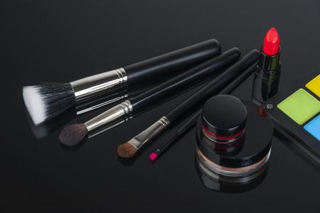 Set of professional makeup and cosmetics. on a black background isolatedの写真素材