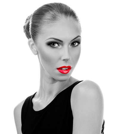 Professional Make up concept. Portrait of young beautiful woman with beauty makeup and perfect skin. Isolated on white backgroundの写真素材