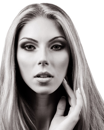Professional Make up concept. Portrait of young beautiful woman with beauty makeup and perfect skin. Isolated on white backgroundの写真素材