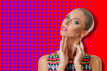 Professional Make up concept. Portrait of young beautiful woman with beauty makeup and perfect skin. on color backgroundの写真素材
