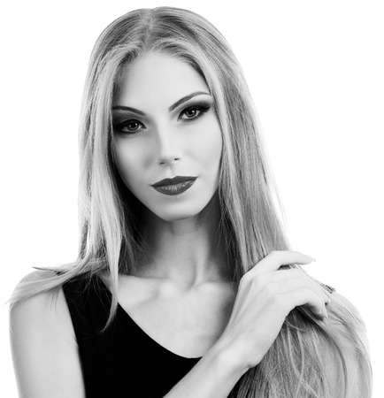 Professional Make up concept. Portrait of young beautiful woman with beauty makeup and perfect skin. Isolated on white backgroundの写真素材