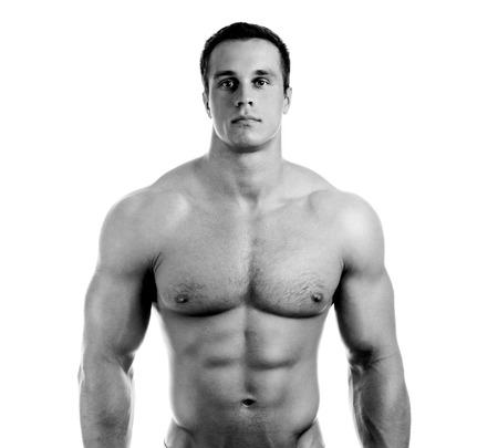 bodybuilder posing. Handsome power athletic guy male. Fitness muscular body.  Isolated on white backgroundの写真素材