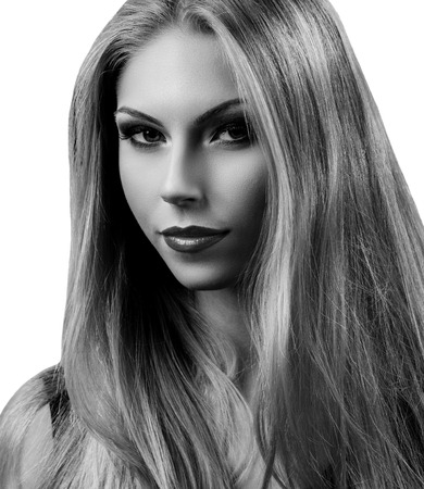 Professional Make up concept. Portrait of young beautiful woman with beauty makeup and perfect skin. Isolated on white backgroundの写真素材