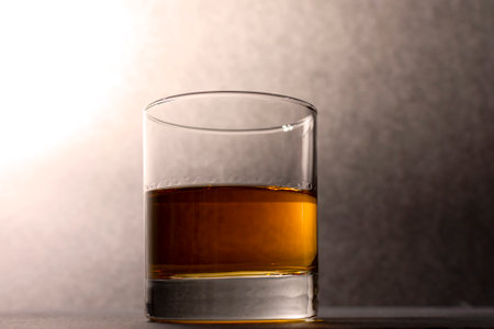 glass goblet with whiskey on a dark background. High quality photoの写真素材