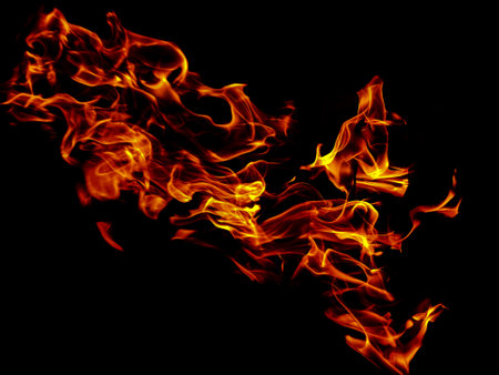 bright tongues of burning flames on a black background. High quality photo