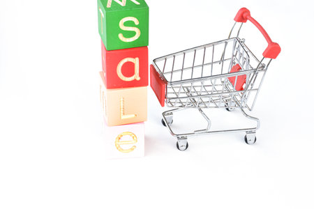 shopping trolley and the inscription sale on a white background. High quality photoの写真素材