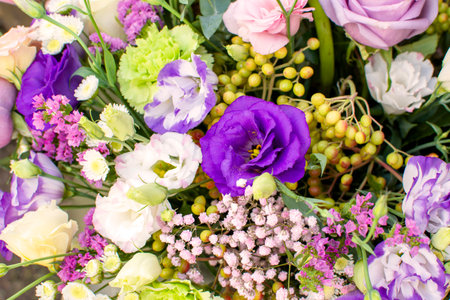 a bouquet of various flowers of different colors close-up. High quality photoの写真素材