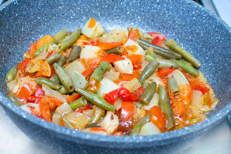diet vegetable mixture is heated in a frying pan. High quality photoの写真素材