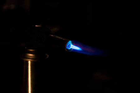 lit gas burner on a dark background. High quality photoの写真素材