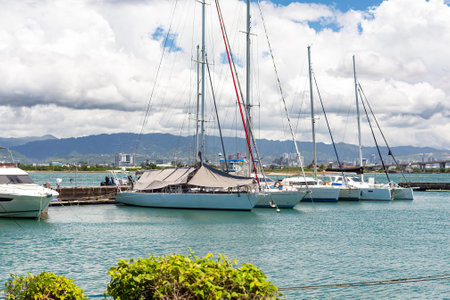 many sailing and motor yachts on the pier in the port.の写真素材