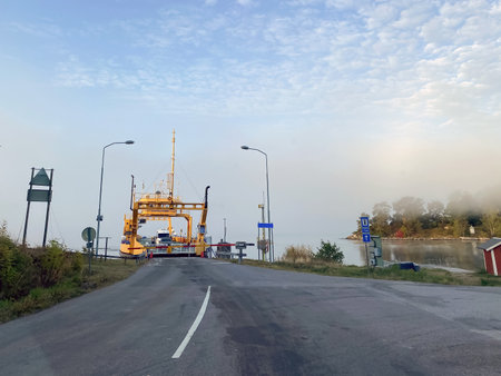car passenger ferry in the Baltic sea, ferry crossing on a foggy early morning.の写真素材
