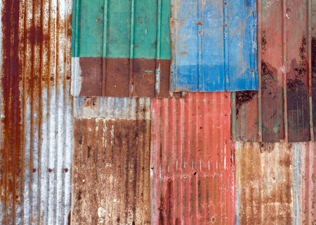 multi-colored iron sheets, corrugated sheets of old roofing material, colored backgroundの写真素材