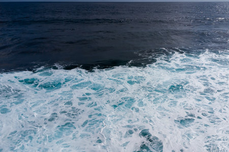 raging powerful ocean waves aerial viewの写真素材