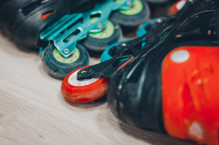 Black old roller skates on the roller rink. Wheels close up view. Ready to skate concept.の写真素材