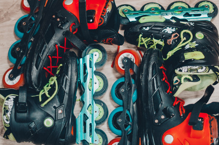 Black old roller skates on the roller rink. Wheels close up view. Ready to skate concept.の写真素材