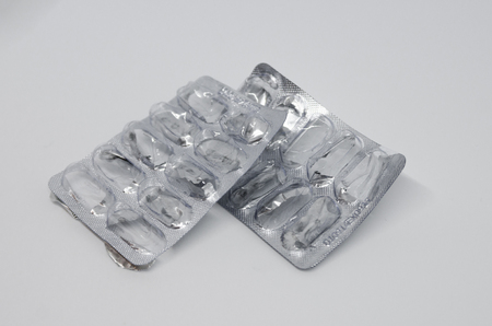 An empty packing of medical pills. Medicine concept isolated on the white background. Cure your pain with capsules treatment. Done with taking tabletssの写真素材