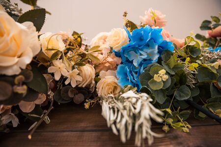 different flowers as decor in wooden boxの写真素材
