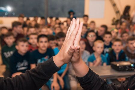 kids comparing hand sizes. who is bigger game conceptの写真素材