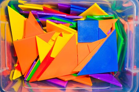colorful constructor pieces and elements in a plastic boxの写真素材