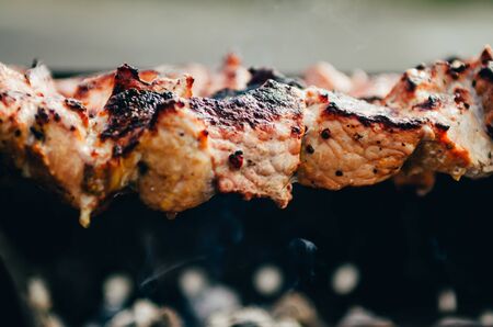 close up view of barbecue on skewersの写真素材