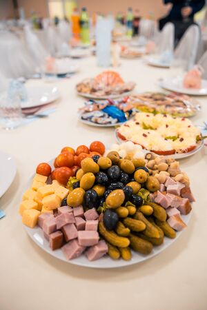 different food served on the table at the restaurantの写真素材