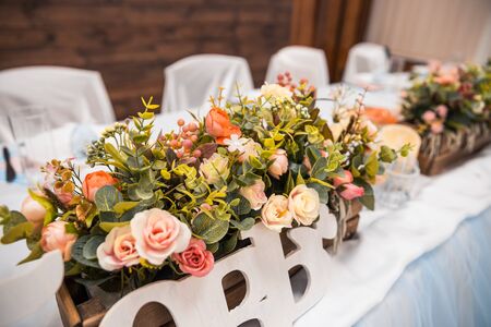 wooden wedding decor whith flowers where is written loveの写真素材