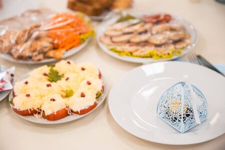 different food served on the table at the restaurantの写真素材