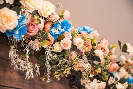 flowers on wooden wall as hall decorの写真素材