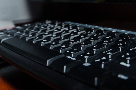 black keyboard of a computer close up viewの写真素材