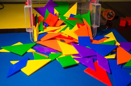 close up view of colorful constructor pieces and elements in a plastic boxの写真素材