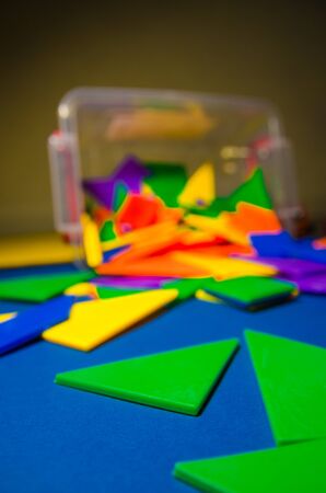 colorful constructor pieces and elements in a plastic boxの写真素材
