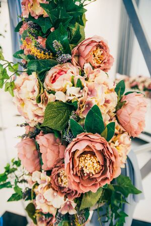 close up view of flowers as decor on a wedding archの写真素材
