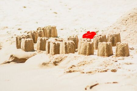 close up view of sand castles on the beachの写真素材