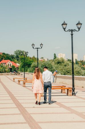 holding hands while walking with couple.  love ion the streetの写真素材