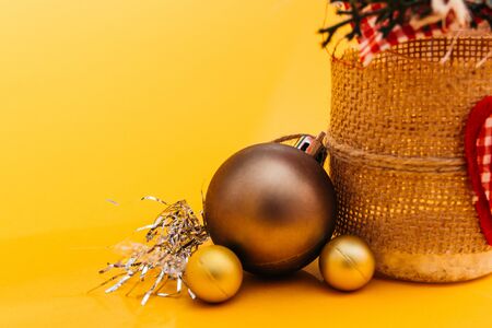 set of golden christmas decorations. christmas tree balls of different sizes and a jarの写真素材