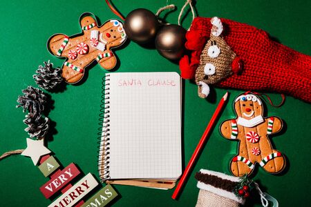 background of christmas holiday composition. handwritten letter to santa claus with copyspaceの写真素材