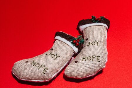 two identical christmas stockings. decoration for houseの写真素材