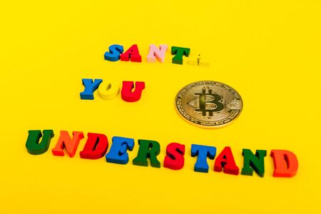 asking santa for money. bitcoin is a cryptocurrencyの写真素材
