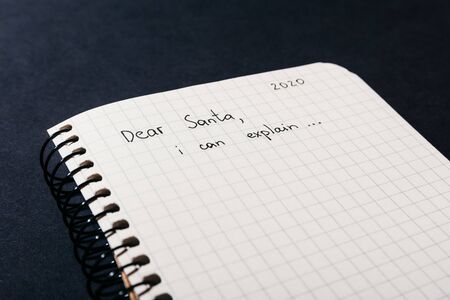 handwritten child letter to santa claus for 2020 new year with copyspace. santa i can explain. apologizing for the bad behaviorの写真素材