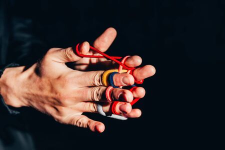 conundrum with fingers. untangle concept. develop mentally. brain gameの写真素材