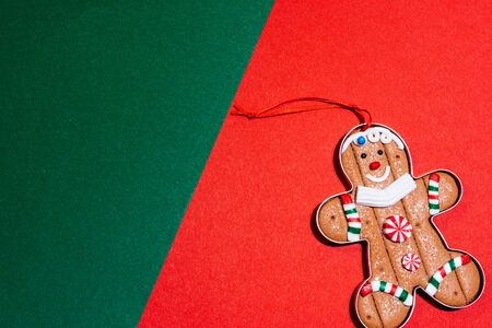 christmas tree toy ginger cookie. gingerman is smiling and is happy for christmas to come