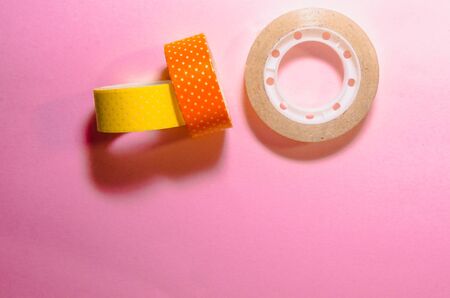 colorful washi tapes isolated on pink background. Feminine stationeryの写真素材
