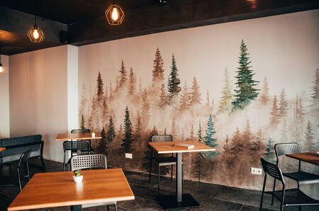 coffee shop interior. wooden table with chairs. work placeの写真素材