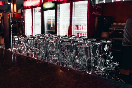 a set of glass cups on bar counterの写真素材