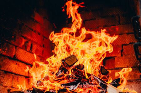 texture background of fire flame with coals in furnaceの写真素材